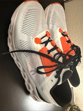 On Running Women’s Sneakers in White, Orange & Black